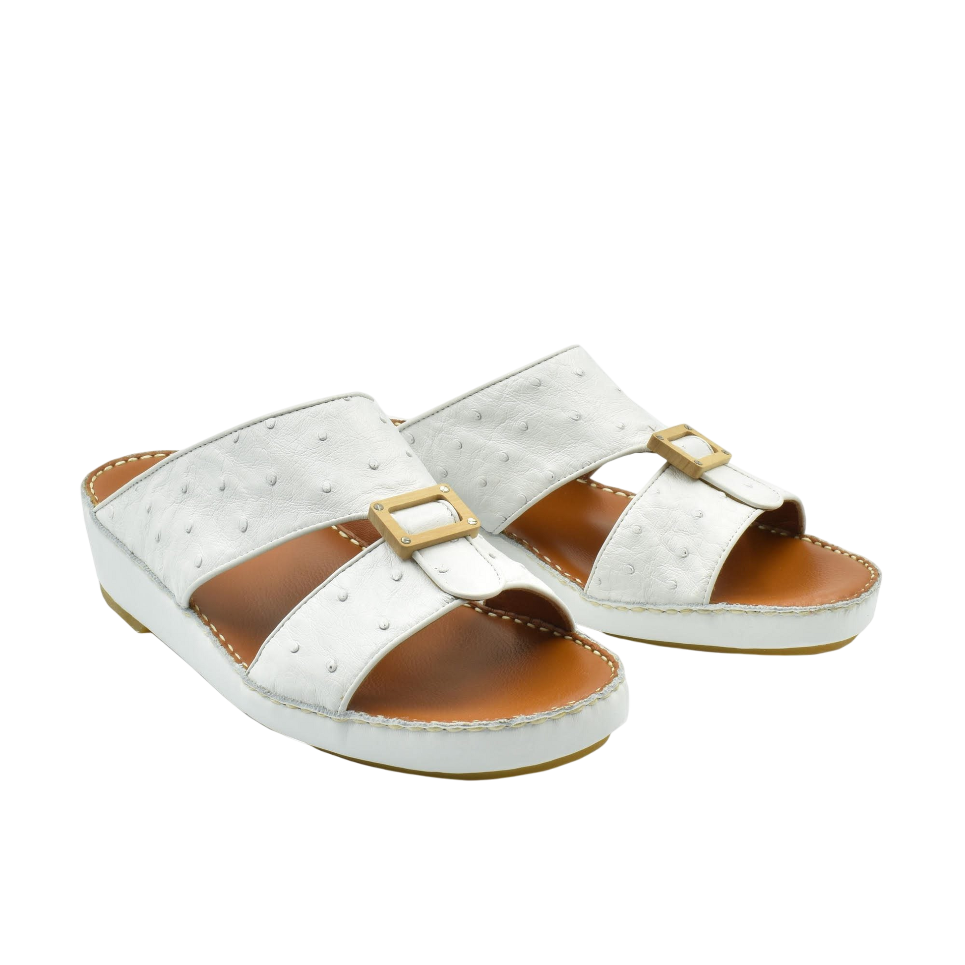 Handcrafted olive sandals in white with buckle detail and cushioned brown footbed for comfortable wear
