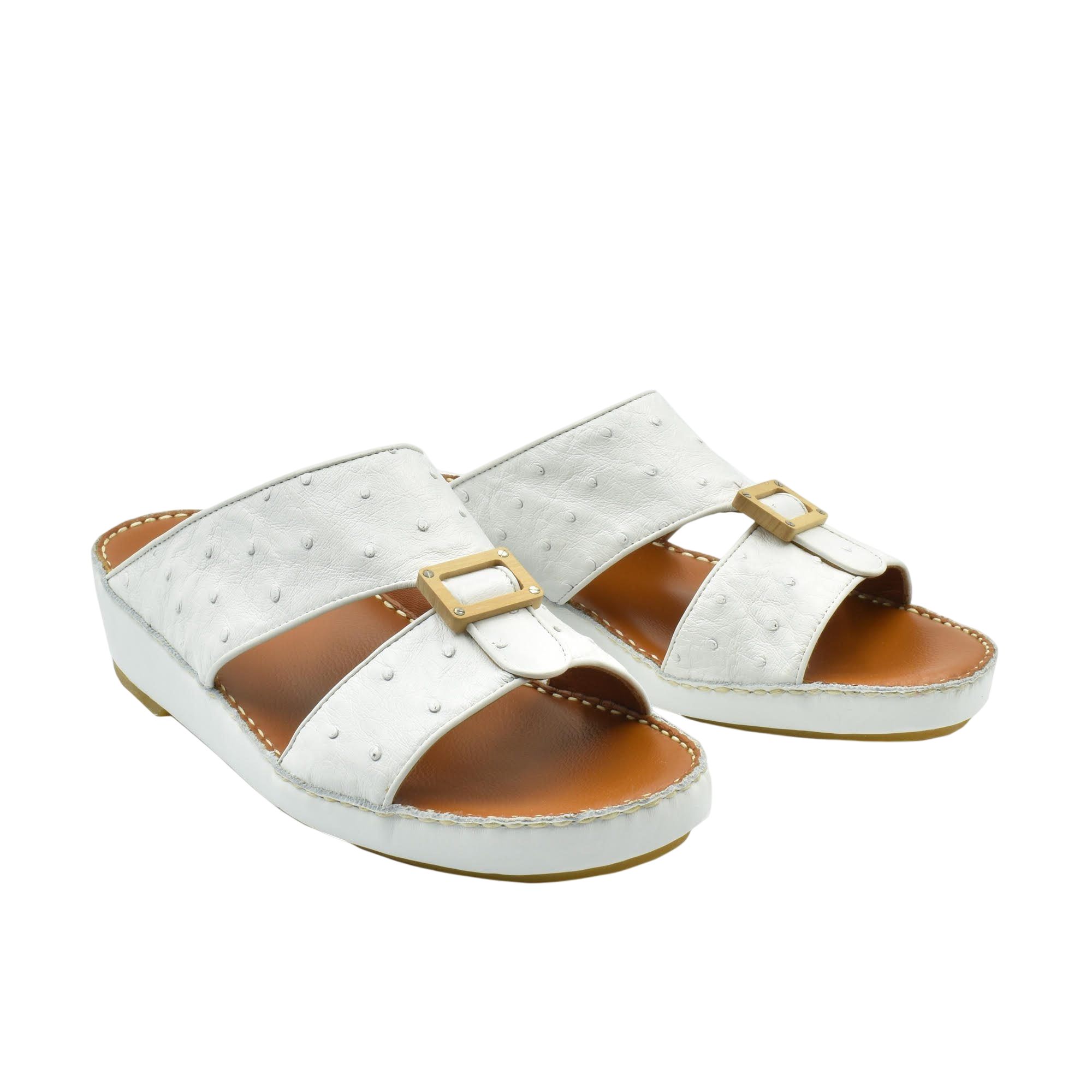 Handcrafted olive sandals in white with buckle detail and cushioned brown footbed for comfortable wear