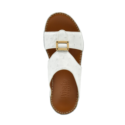 Top view of handcrafted olive sandals with white straps and brown sole by Private Collection