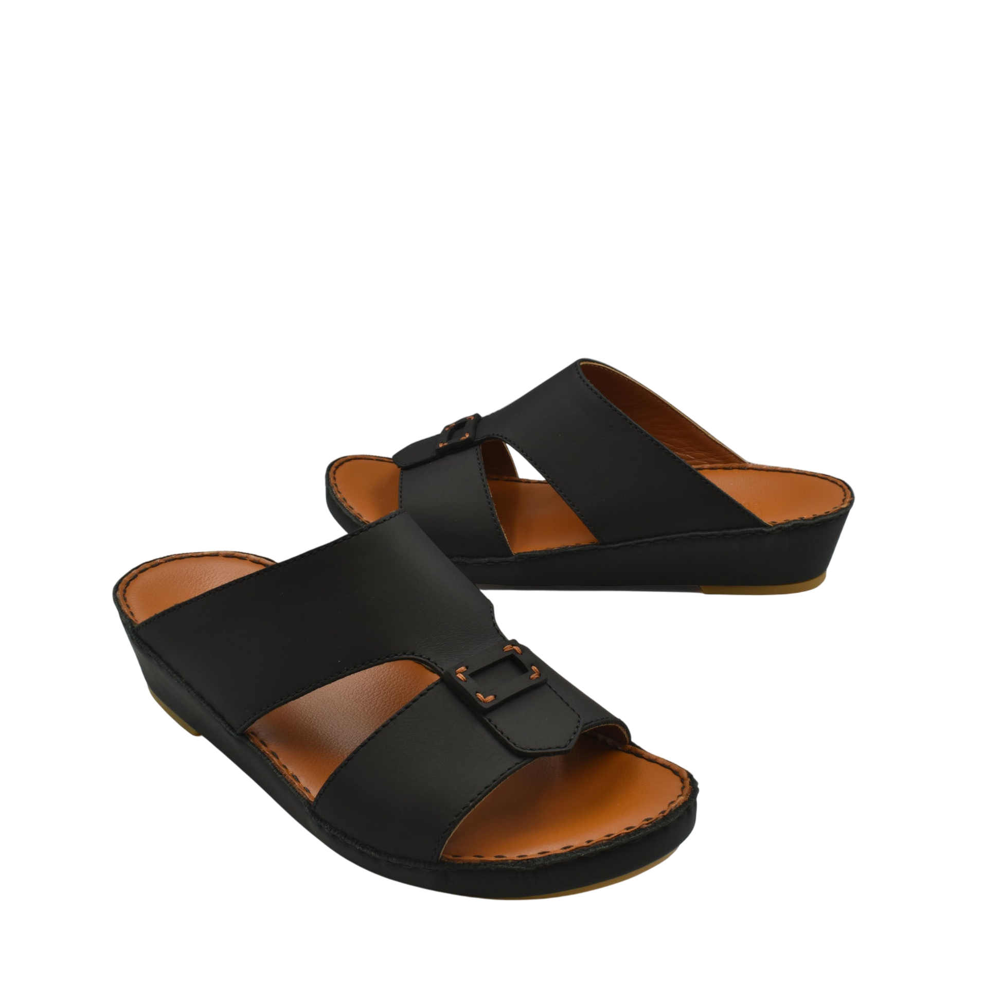 Black slip-on Italian leather sandals with adjustable buckle and cushioned sole for comfort