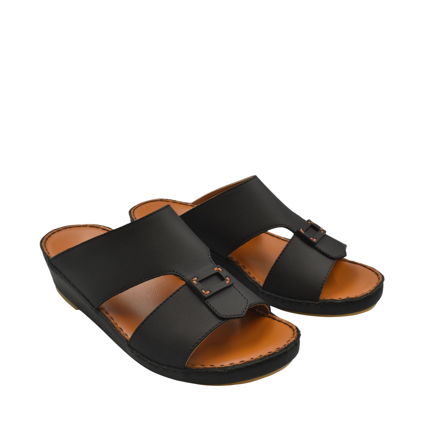 Black Italian leather sandals with buckle detail and tan cushioned footbed from private collection