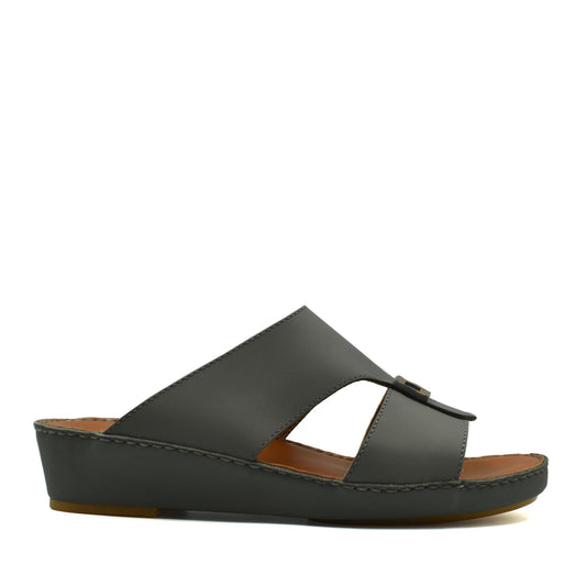 Black Italian leather sandals with wedge heel and open toe design from Private Collection