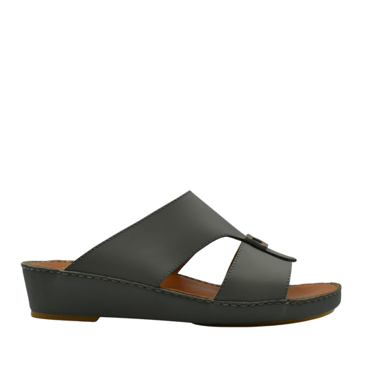 Black Italian leather sandals with wedge heel and open toe design from Private Collection