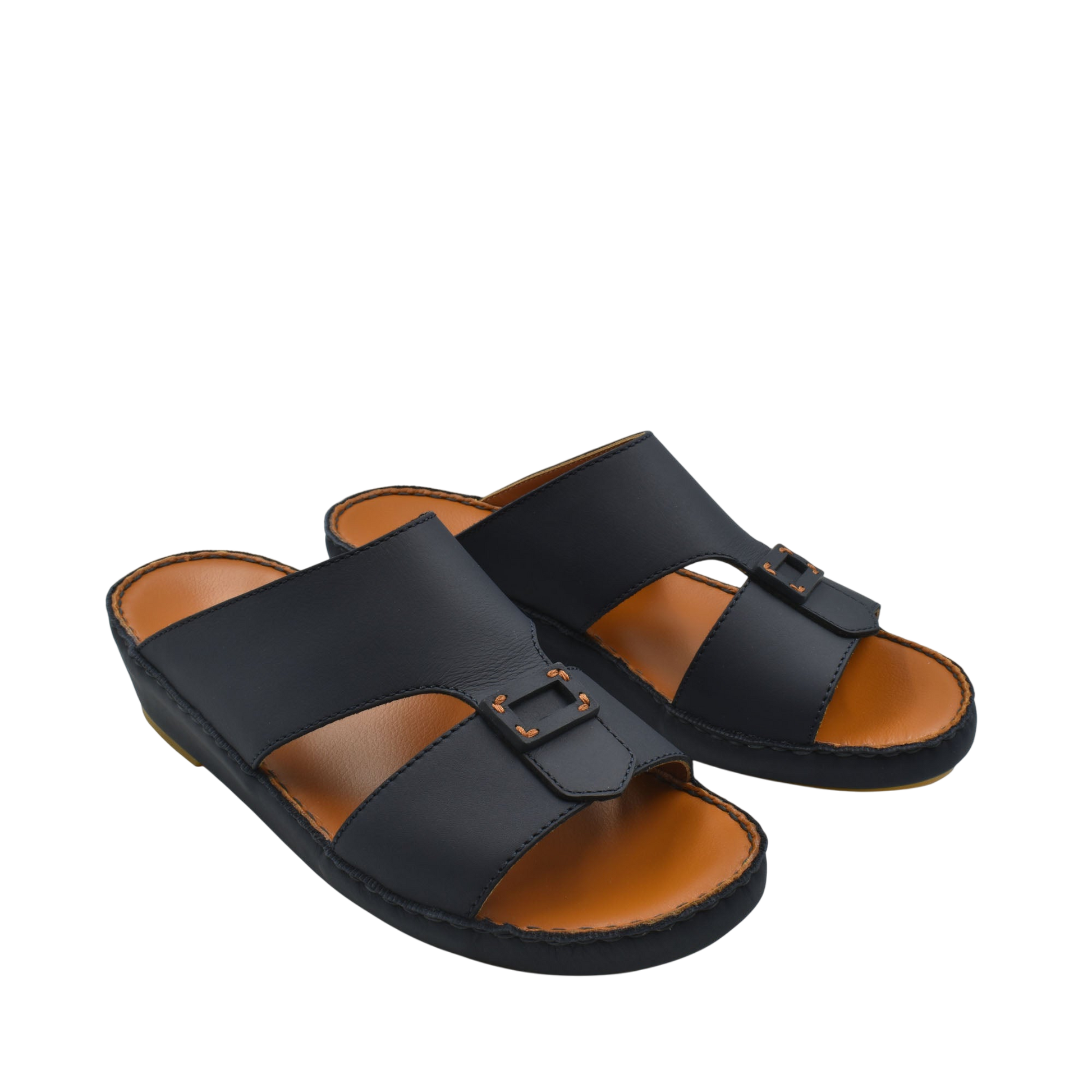 Black Italian leather sandals with buckle detail and cushioned tan footbed from private collection