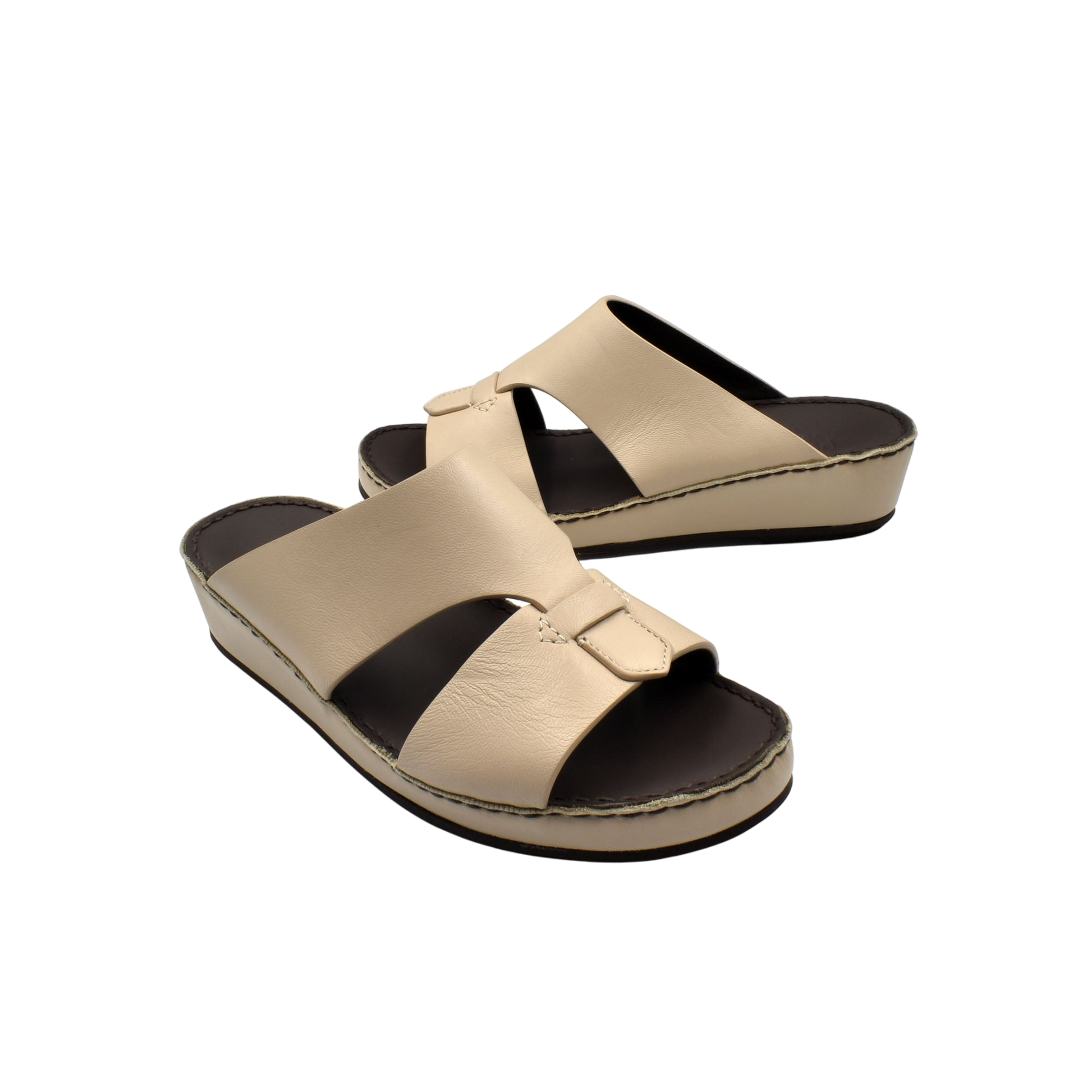 Beige kids leather sandals with double strap and cushioned sole in a private collection