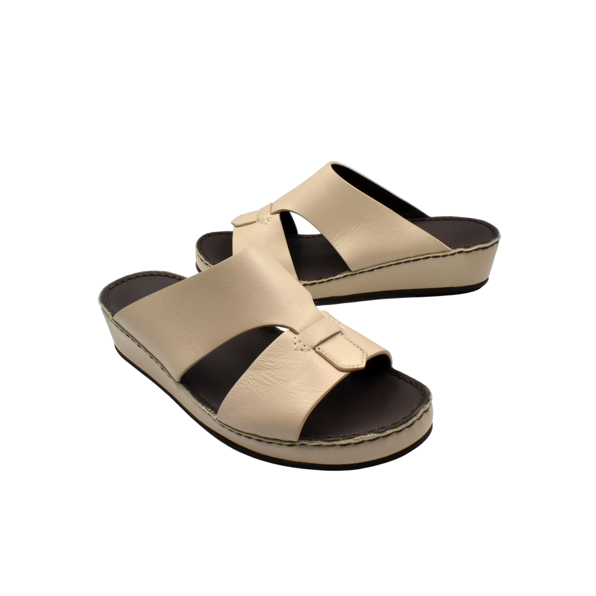 Beige kids leather sandals with double strap and cushioned sole in a private collection