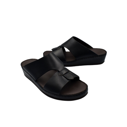 Black kids leather sandals with adjustable straps and cushioned footbed for comfortable wear