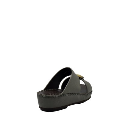 Back view of grey kids leather sandals with thick sole and open heel design