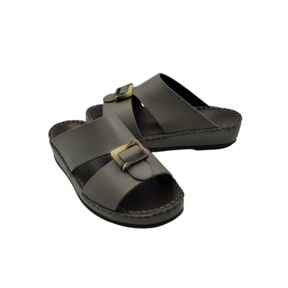 Olive green kids leather sandals with adjustable buckle straps and cushioned soles