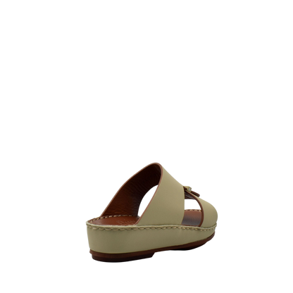 Beige kids rubber calf sandals with an open toe and adjustable buckle strap from Private collection