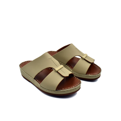 Beige kids rubber calf sandals with open toe and stitched sole in a private collection