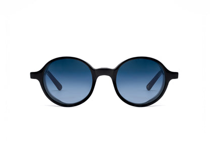 Round black frame sunglasses with blue gradient lenses from luxury eyewear collection