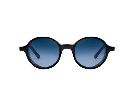 Round black frame sunglasses with blue gradient lenses from luxury eyewear collection