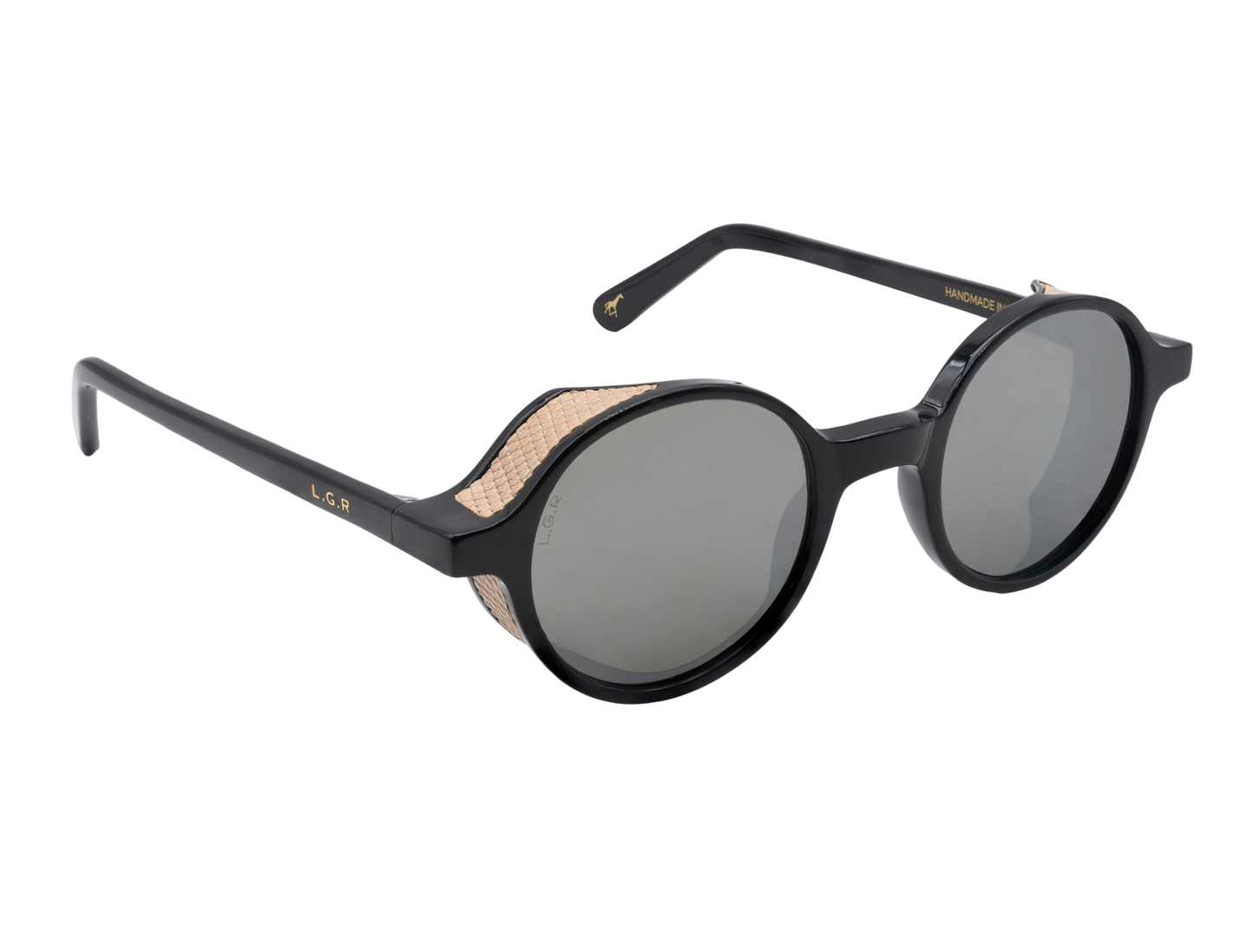 Black round frame luxury sunglasses with textured beige side shields and dark lenses