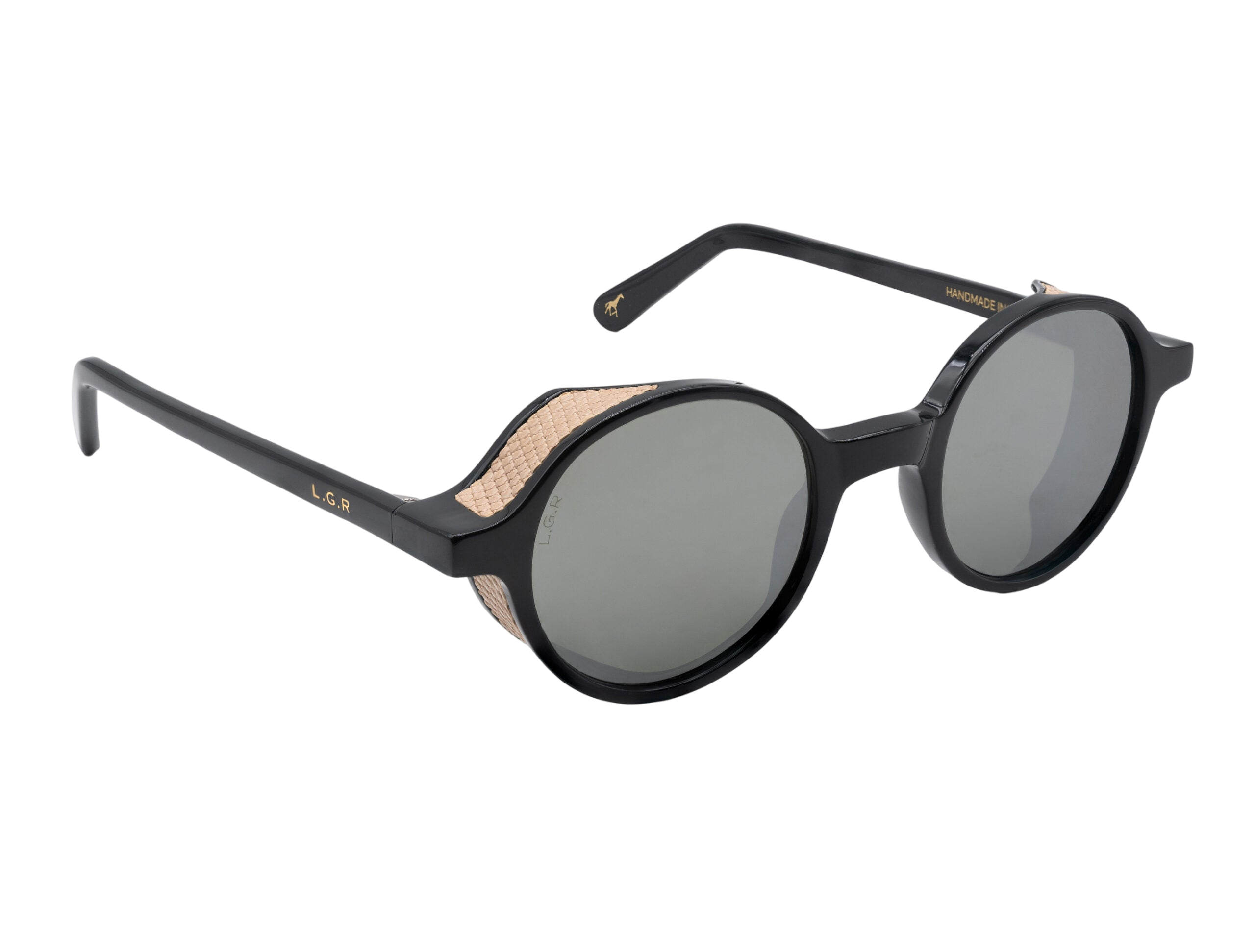 Black round frame luxury sunglasses with textured beige side shields and dark lenses