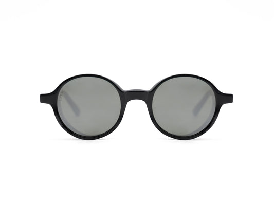 Round frame luxury sunglasses with black frames and gray lenses on white background