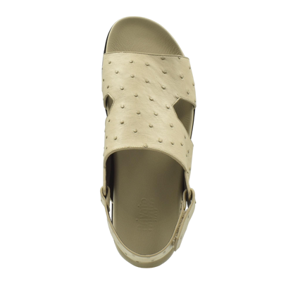 Top view of beige open-toe Luxury Amorti Sangle Footwear sandal with textured upper and adjustable strap