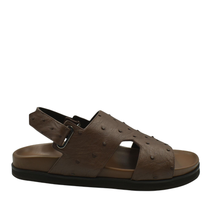 Brown leather sandal with adjustable strap featuring Luxury Amorti Sangle Footwear design