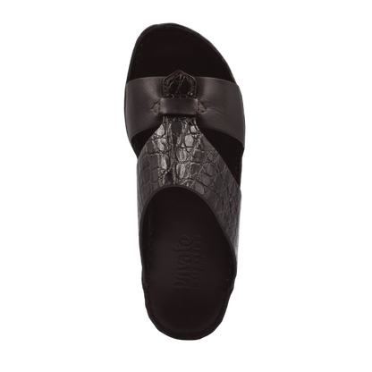 Top view of luxury croco leather sandals in black with textured crocodile pattern and smooth straps