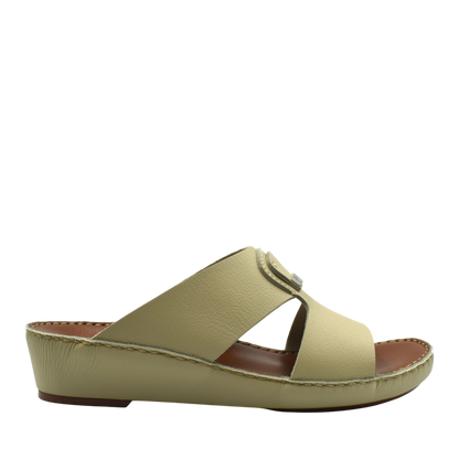 Side view of beige luxury deercalf sandals with wedge sole and open toe design