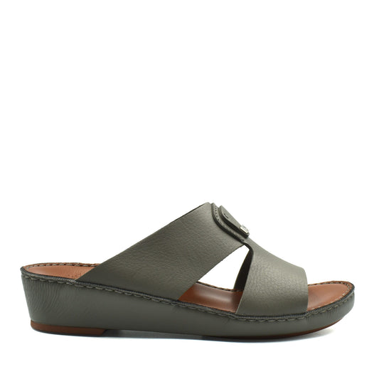 Side view of luxury deercalf sandals in muted green with cushioned sole and open toe design