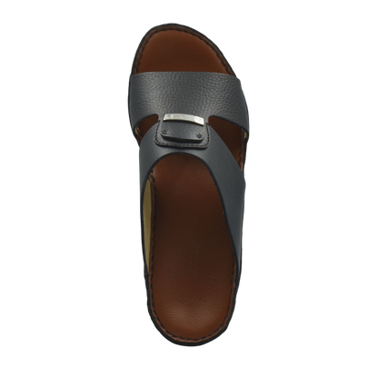 Top view of luxury deercalf sandals in black with brown sole and adjustable strap