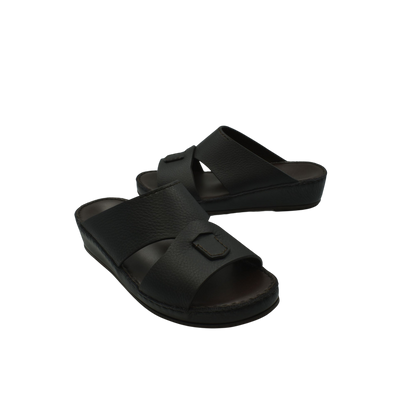 Black luxury kids leather sandals with cross strap design and cushioned sole from private collection