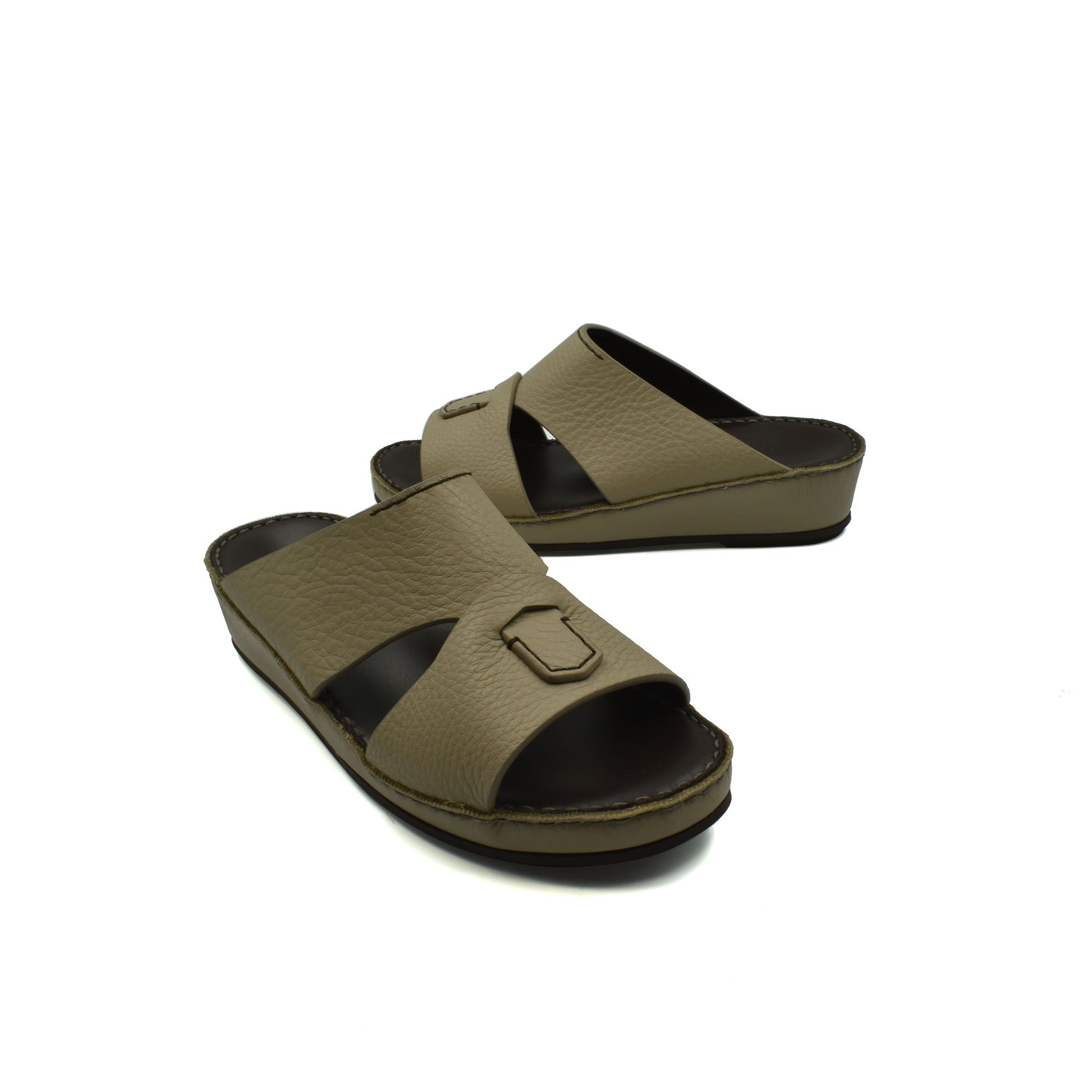 Pair of luxury kids leather sandals in tan with open toe design and cushioned soles
