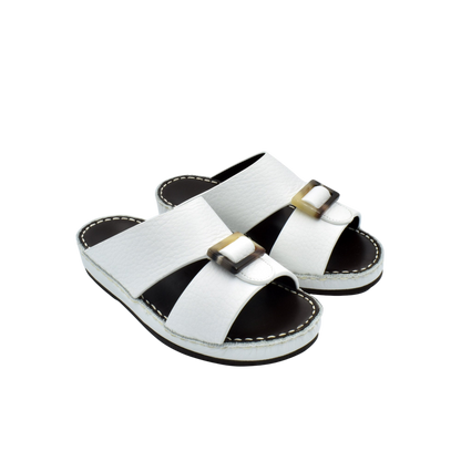 White luxury kids sandals with buckle detail and stitched sole from Private Collection