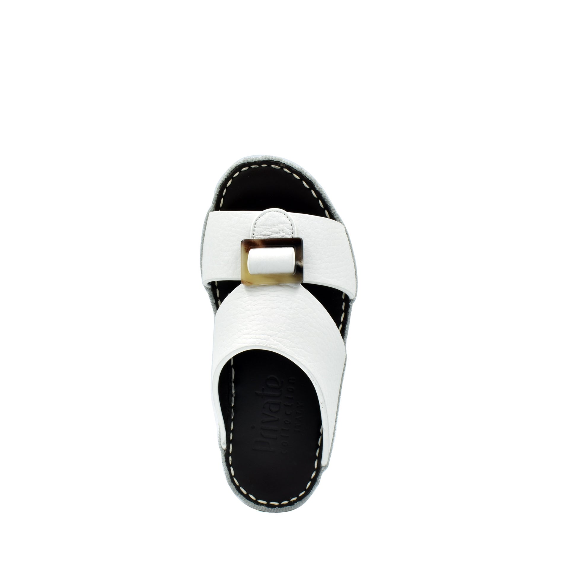 White luxury kids sandals with buckle detail and black sole from Private Collection