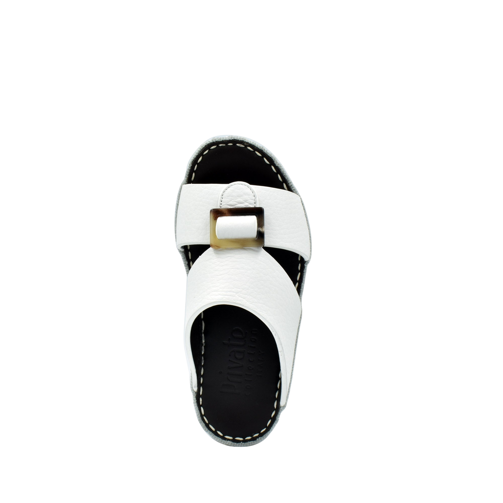 White luxury kids sandals with buckle detail and black sole from Private Collection