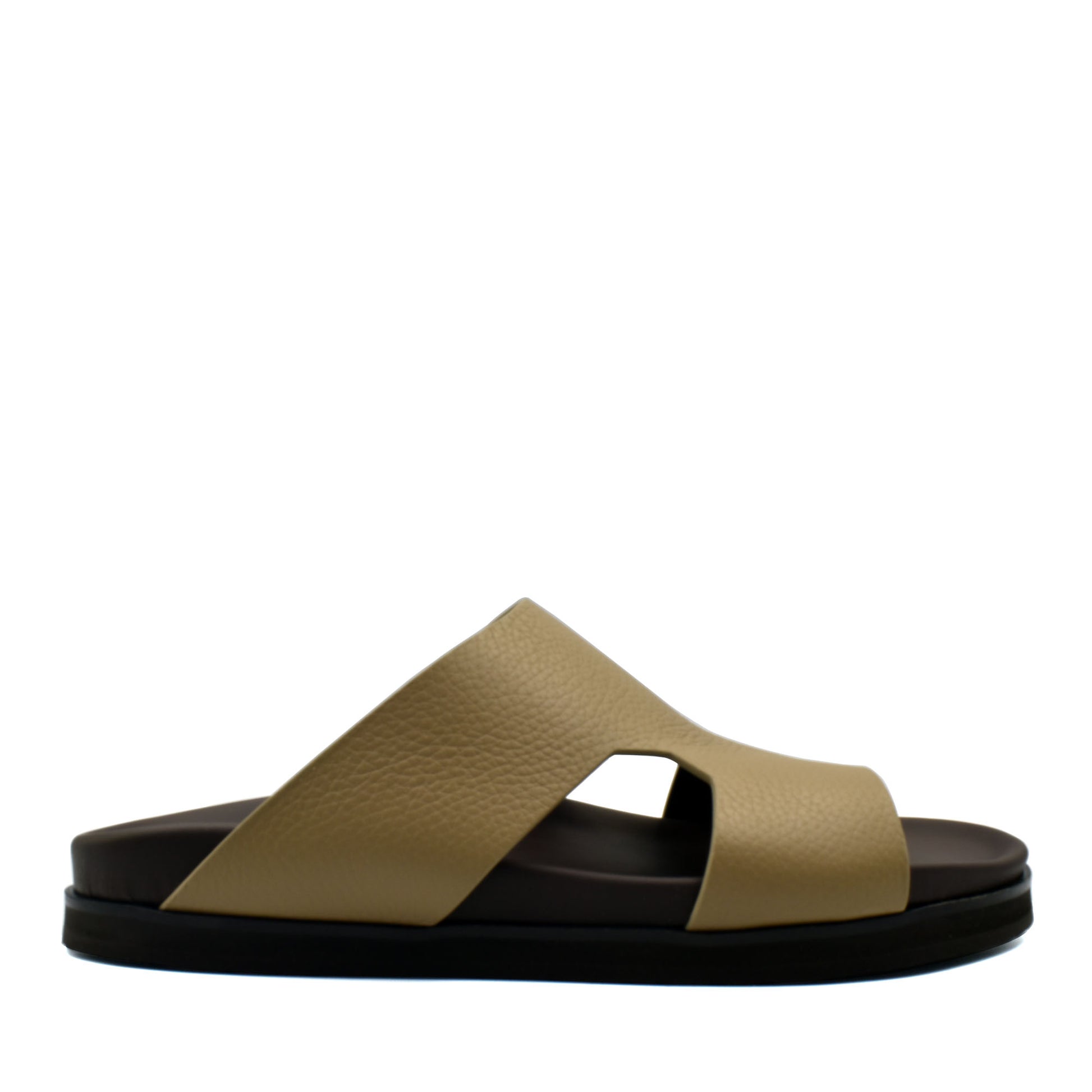 Beige and black luxury leather sandals with wide crisscross straps and textured finish
