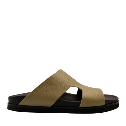 Beige and black luxury leather sandals with wide crisscross straps and textured finish