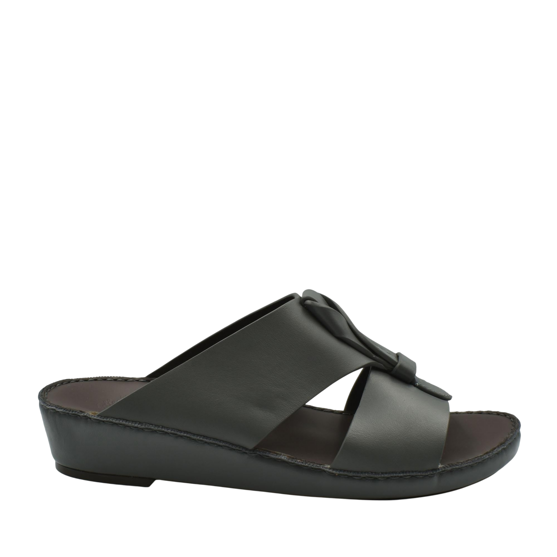 Black luxury leather sandals with a low wedge heel and wide crisscross straps