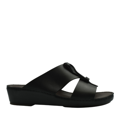 Black luxury leather sandals with a wedge sole and open toe design