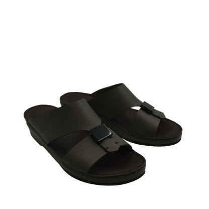Pair of black luxury leather sandals with adjustable buckle straps and cushioned soles