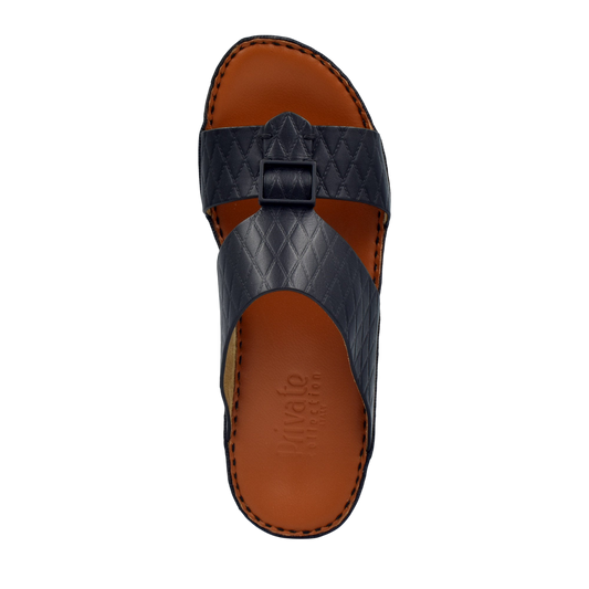 Private Collection luxury leather sandals in black with stitched brown sole and quilted straps
