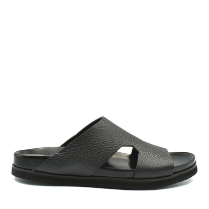 Black luxury leather sandals with textured upper and cushioned sole for comfortable wear
