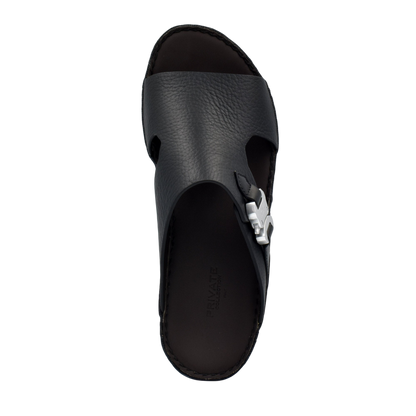 Black luxury leather sandals with textured upper and silver buckle detail by Private Collection