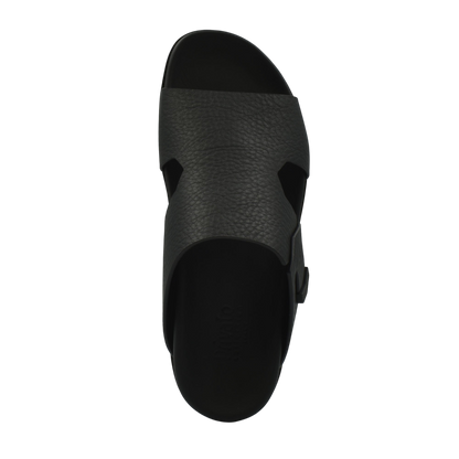Top view of a black luxury leather sandals with textured wide strap and open toe design