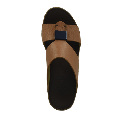 Top view of a brown luxury leather sandals with black sole and buckle detail