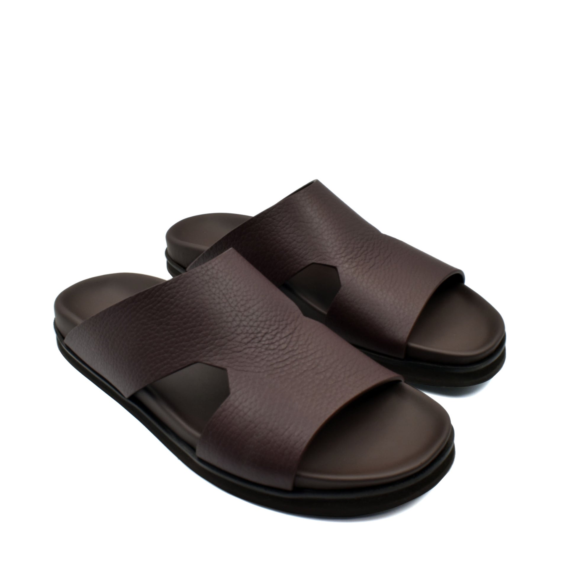Brown luxury leather sandals with wide straps and cushioned soles for comfortable wear