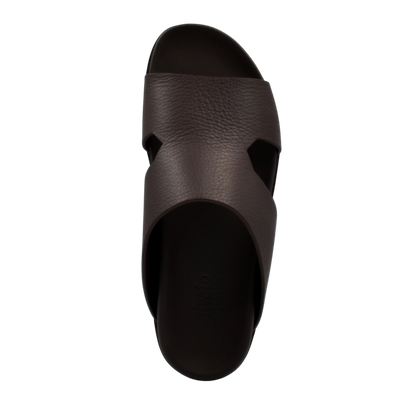Top view of brown luxury leather sandals with cushioned sole and wide strap design
