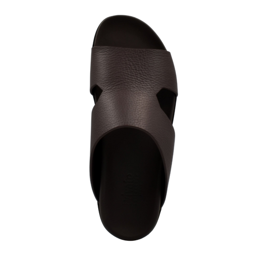 Top view of brown luxury leather sandals with cushioned sole and wide strap design