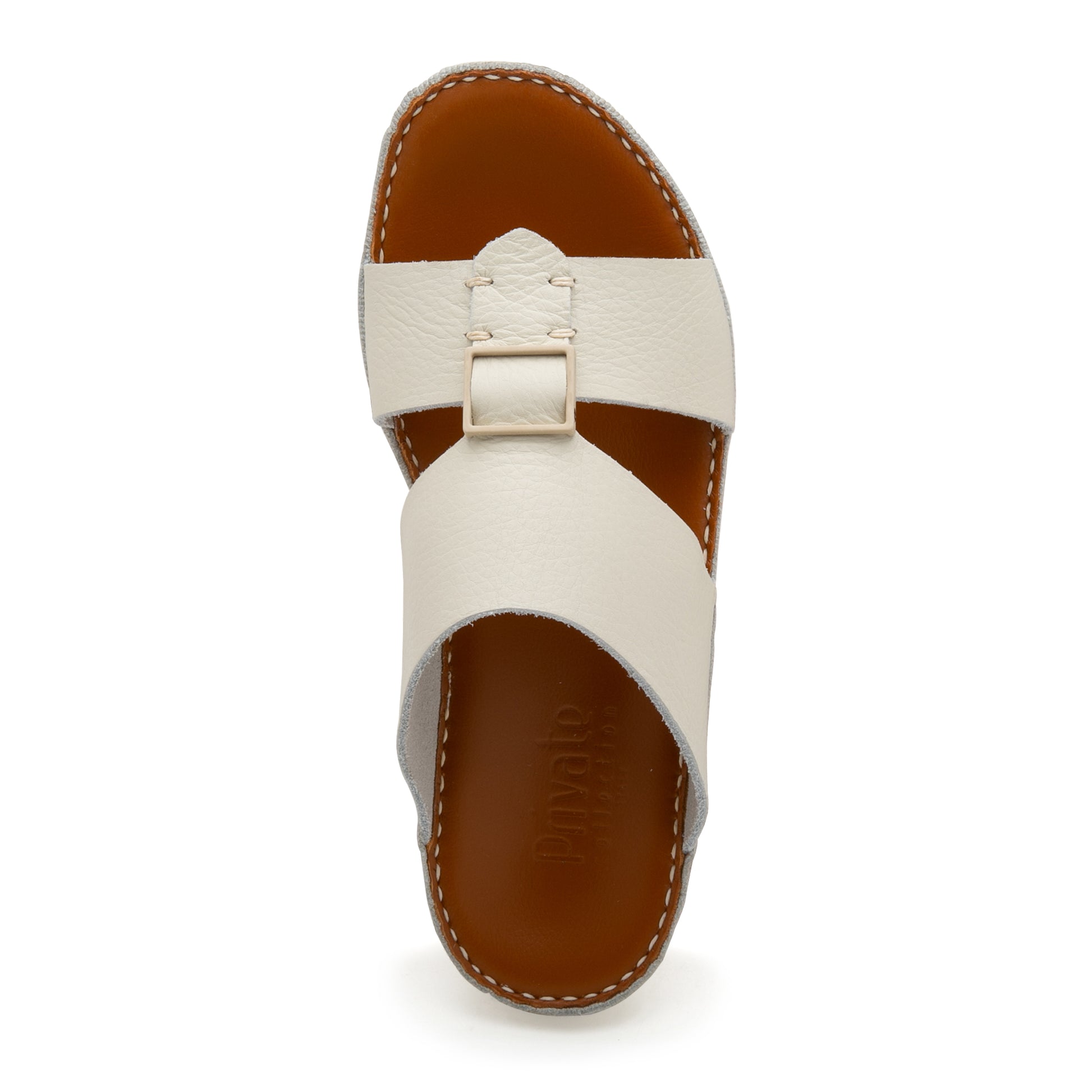 Private Collection luxury leather sandals in white with a buckle and brown sole top view