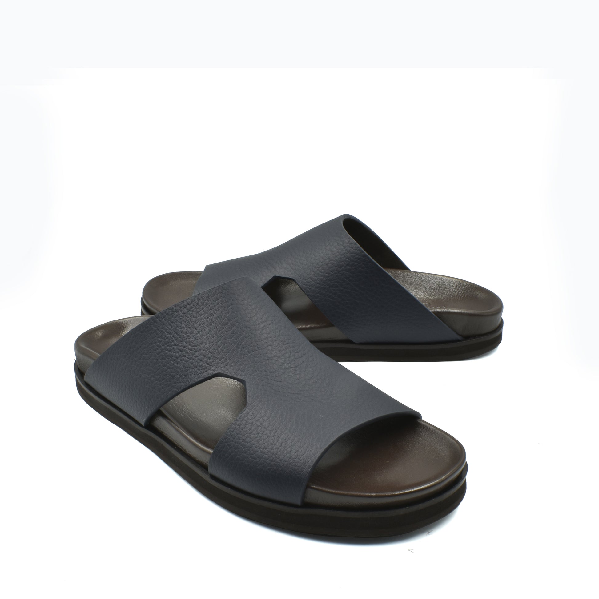 Black luxury leather sandals with wide straps and cushioned soles from Private Collection