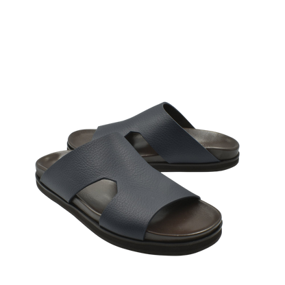 Black luxury leather sandals with wide straps and cushioned soles from Private Collection
