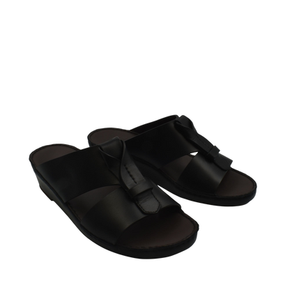 Black luxury leather sandals with open toe design and cushioned footbed for comfortable wear