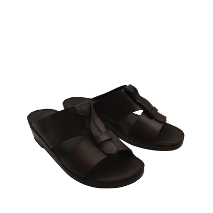 Pair of dark brown luxury leather sandals with wide straps and cushioned soles