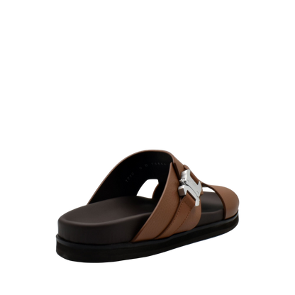 Brown luxury leather sandals with black sole and silver buckle from Private Collection